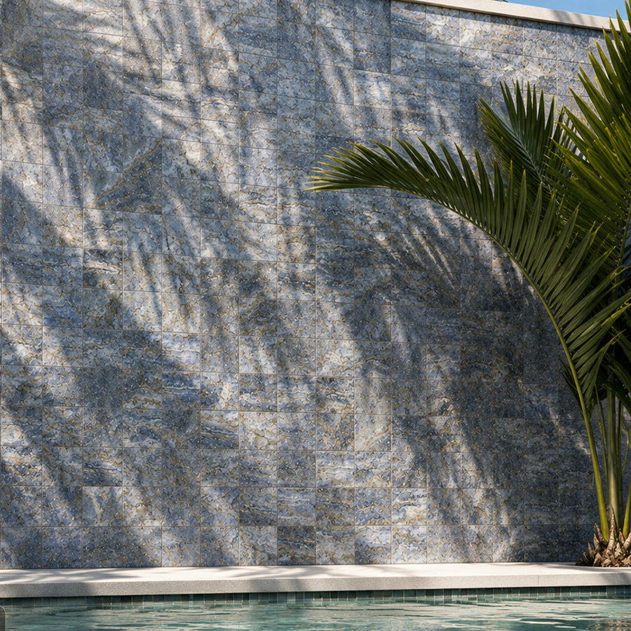6x6 blue porcelain tile on a raised pool wall with palm shadows and turquoise water