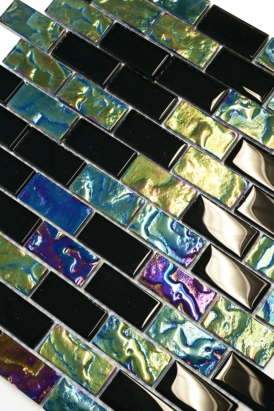 Close-up of Black Opal glass mosaic pool tile showing glossy black chips beside iridescent purple, green and blue chips.