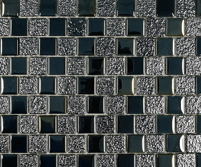 Close-up of Midnight Black and Silver Glitter glass mosaic tile showing glossy black chips beside sparkling silver glitter chips.