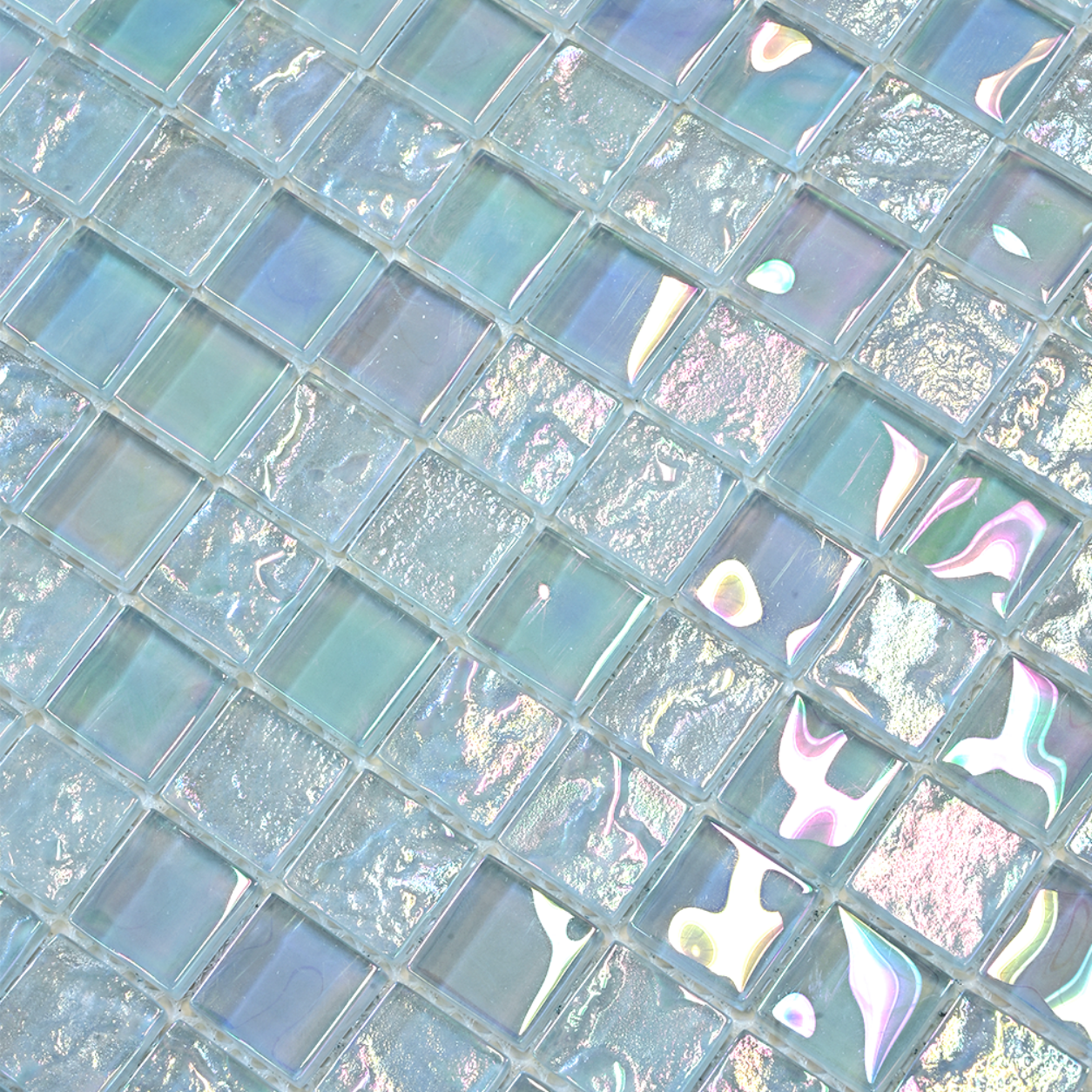 Macro close-up of Opaline Pearl crystal glass mosaic showing iridescent pearl-white square chips.